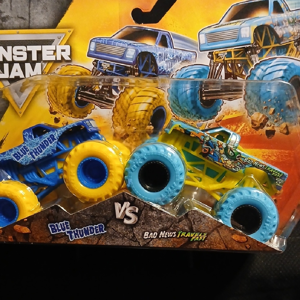 Bad News Travels Fast & BLUE THUNDER Monster Jam Truck Set. 1/64